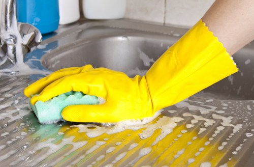 Close-up of carpet cleaning equipment and treated floor surface